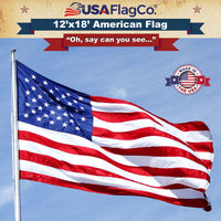 Large 12x18 ft American Flag proudly displayed, showing sewn stripes and embroidered stars.