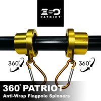 360° Patriot anti-wrap flagpole spinners with gold clamps and black shaft on a white background.