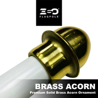 Brass acorn ornament on a white background with ESO Flagpole logo.